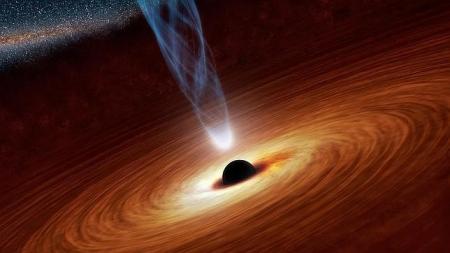 Hallan un agujero negro gigantesco que gira casi a la velocidad de la luz 